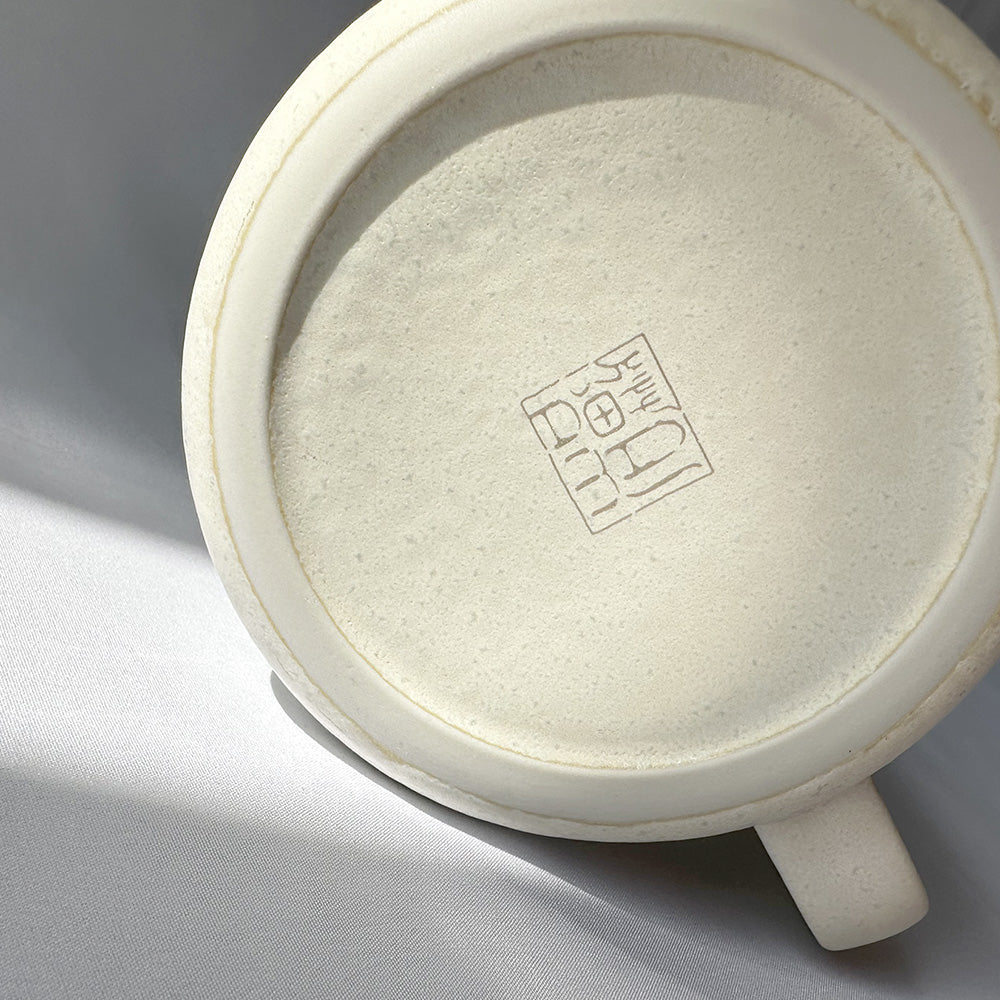 底には「I AM A CAT 」のハンコのロゴ入り